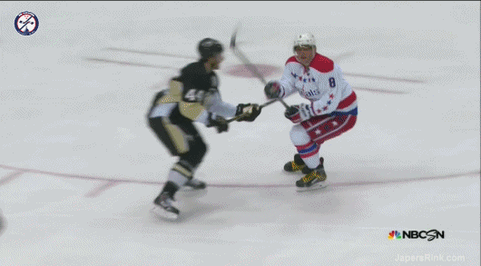 Ovechkin_gets_his_stick_swatted_away_and_still_scores
