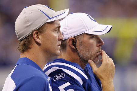 INDIANAPOLIS, IN - AUGUST 26: Peyton Manning (L) and Kerry Collins #5 of the Indianapolis Colts look on during the first half of an NFL preseason game against the Green Bay Packers at Lucas Oil Stadium on August 26, 2011 in Indianapolis, Indiana. (Photo by Joe Robbins/Getty Images)