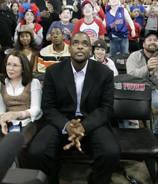 Chris Webber watches from the stands
