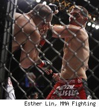 Nick Diaz beats B.J. Penn at UFC 137.