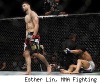 Carlos Condit walks off after knocking out Dong Hyun Kim, UFC 132
